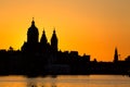 Amsterdam cityscape skyline with Church of Saint Nicholas Sint-Nicolaaskerk during sunset. Picturesque of Amsterdam, Netherlands.