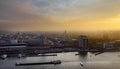 Amsterdam cityscape top view at sunset. River with ships, boats, Central station. Sightseeing of Dutch