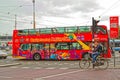 Amsterdam citysightseeing bus at the intersection in city center Royalty Free Stock Photo