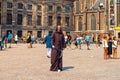 Living statue, Grim reaper, Palace on the Dam Square in the summer