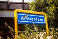 Amsterdam damaged road sign. Close-up photo Royalty Free Stock Photo