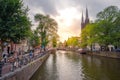 Amsterdam, with flowers and bicycles on the bridges over the canals, Holland, Netherlands. Royalty Free Stock Photo