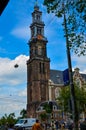 Amsterdam, Holland, August 2019. The bell tower of the Western Church, in Dutch Royalty Free Stock Photo