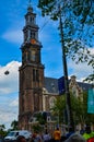 Amsterdam, Holland, August 2019. The bell tower of the Western Church, in Dutch Royalty Free Stock Photo