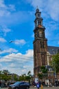 Amsterdam, Holland, August 2019. The bell tower of the Western Church, in Dutch Royalty Free Stock Photo
