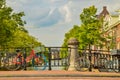 Amsterdam, Holland, August 2019. The red frame of a bike parked on a bridge captures the attention giving an image that is a Royalty Free Stock Photo