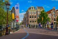 Amsterdam, Holland, August 2019. The typical and charming houses: they are a symbol of the city represented on a postcard. With