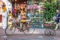 Amsterdam in Holland with its magnificent brunch breakfast canals, its levi barge bridge and traditional boat, flowery city bike