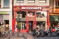 Amsterdam in Holland with its magnificent brunch breakfast canals, its levi barge bridge and traditional boat, flowery city bike