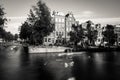 Amsterdam, Holland, the Netherlands - July 6 2020: capture of the typical Amsterdam scenery at a water crossing of a canal,