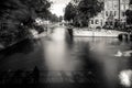 Amsterdam, Holland, the Netherlands - July 6 2020: capture of the typical Amsterdam scenery at a water crossing of a canal staging