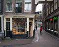 Amsterdam Cheese Deli shop front window, next to the Febo fast food restaurant