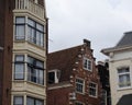 Close up of Leaning and tilting houses in Amsterdam along the canal.