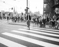 Mobile perspective cyclist in striped tee- shirt rides across cr