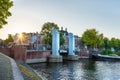 Amsterdam lift bridge canal river with boats