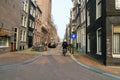 Amsterdam, March, 2007, Old man cycling alone in Amsterdam