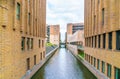 A look through over a channel in the newly developed area IJburg just outside Amsterdam Royalty Free Stock Photo