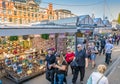 Amsterdam, May 7 2018 - Tourist searching for souvenirs and flow