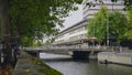 Amsterdam morning in center city - bridge with bicycles and cars on canal, Autumn, Netherlands Royalty Free Stock Photo