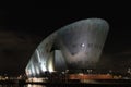 Amsterdam NEMO museum at night canal view