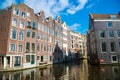 Classical view of traditional buildings at the canal side in Amsterdam downtown. Royalty Free Stock Photo