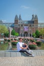 Amsterdam Netherlands April 2020, almost empty Amsterdam Rijksmuseum square during the corona covid 19 outbreak virus in Europe