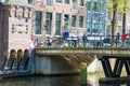 Historical bridge over canal in Amsterdam, Holland Royalty Free Stock Photo