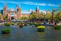 Rijksmuseum in Amsterdam with pond and flowery decoration, Netherlands, Europe