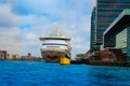 AMSTERDAM, NETHERLANDS, APRIL, 23 2018: Outdoor view of huge cruise in a shore of the canals, is the capital and most