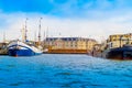 AMSTERDAM, NETHERLANDS, APRIL, 23 2018: Outdoor view of many boats in the shore of canals, is the capital and most