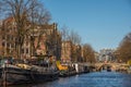 Amsterdam, Netherlands, April 2022. The Prinsengracht in Amsterdam with the Westertoren and houseboats.