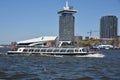 Amsterdam, Netherlands. April 2023. The river IJ with the Eye museum and a canalboat.