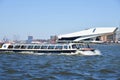 Amsterdam, Netherlands. April 2023. The river IJ with the Eye museum and a canalboat.