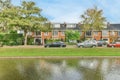 a row of houses overlooking a body of water