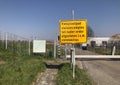 Yellow sign with safety regulations due to coronavirus in Amsterdam Royalty Free Stock Photo