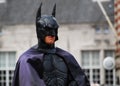 Actor in Batman costume in the central Dam square in Amsterdam.