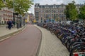 Amsterdam, the Netherlands, August 2019. Bikes parked on the sidewalk in the historic center: they are a city corner. The frames Royalty Free Stock Photo