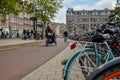 Amsterdam, the Netherlands, August 2019. Bikes parked on the sidewalk in the historic center: they are a city corner. The frames Royalty Free Stock Photo