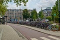 Amsterdam, the Netherlands, August 2019. Bikes parked on the sidewalk in the historic center: they are a city corner. The frames Royalty Free Stock Photo