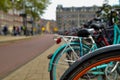 Amsterdam, the Netherlands, August 2019. Bikes parked on the sidewalk in the historic center: they are a city corner. The frames Royalty Free Stock Photo