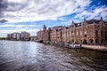 AMSTERDAM, NETHERLANDS - AUGUST 14, 2016: Famous Industrial buildings of Amsterdam city close-up. General landscape view Royalty Free Stock Photo