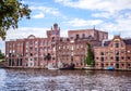 AMSTERDAM, NETHERLANDS - AUGUST 14, 2016: Famous Industrial buildings of Amsterdam city close-up. General landscape view Royalty Free Stock Photo