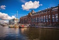 AMSTERDAM, NETHERLANDS - AUGUST 14, 2016: Famous Industrial buildings of Amsterdam city close-up. General landscape view of city Royalty Free Stock Photo