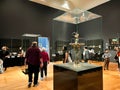 Amsterdam, Netherlands. August 6, 2023. Visitors admire one of the many paintings at the Rijksmuseum in Amsterdam.