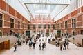 AMSTERDAM, THE NETHERLANDS - AUGUST 03, 2017: Visitors in modern main hall in the new atrium of the Rijksmuseum.