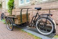 Wooden handcart built on bicycle frame for transporting goods through Amsterdam