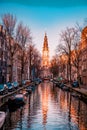 Amsterdam Netherlands Beautiful Groenburgwal canal in Amsterdam with the Soutern church Zuiderkerk at sunset