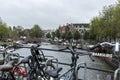 Amsterdam, Netherlands, 10/10/2019: Bicycle parking on a canal in the city