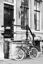 bicycle parking near entrance in monochrome in Amsterdam