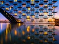 Amsterdam, Netherlands. A cityscape during sunset. A apartment building near the water in the bay.